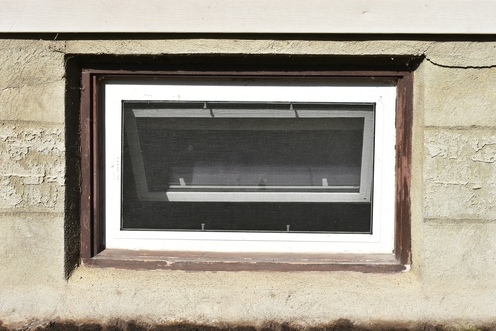 old hopper window that needs to be replaced