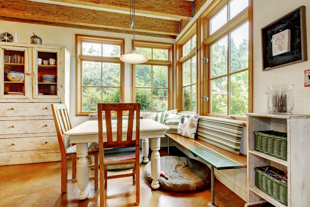 brown windows in a kitchen dining nook